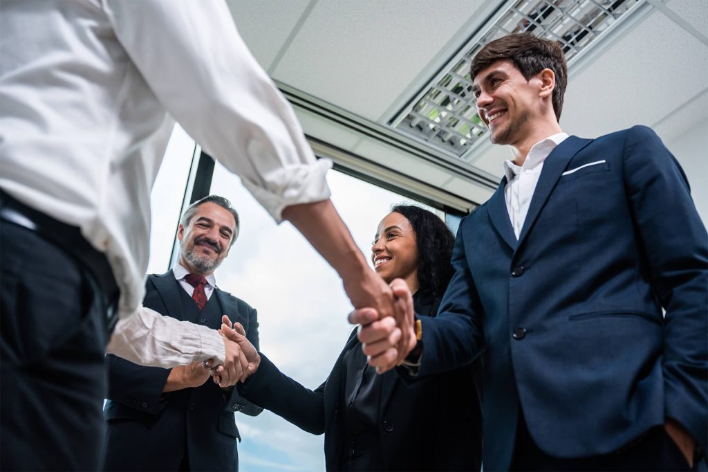 caucasian businessman making a handshake together 2025 03 24 23 14 58 utc